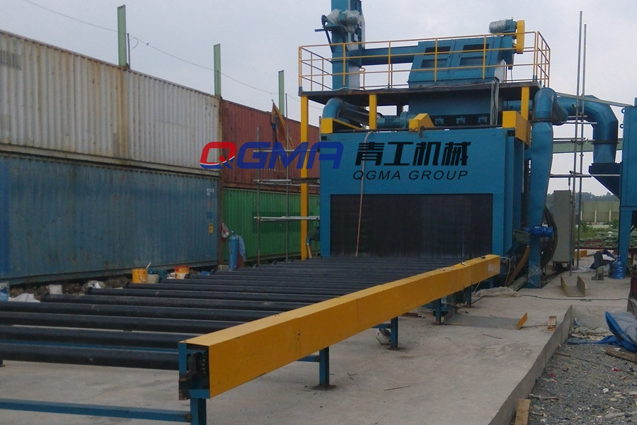 道路護(hù)欄通過式拋丸清理機(jī)的工作原理